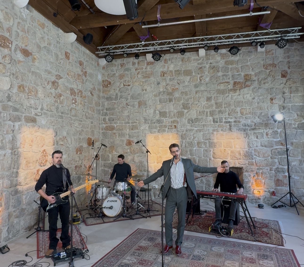 four piece band performing a song in Lazareti, Dubrovnik